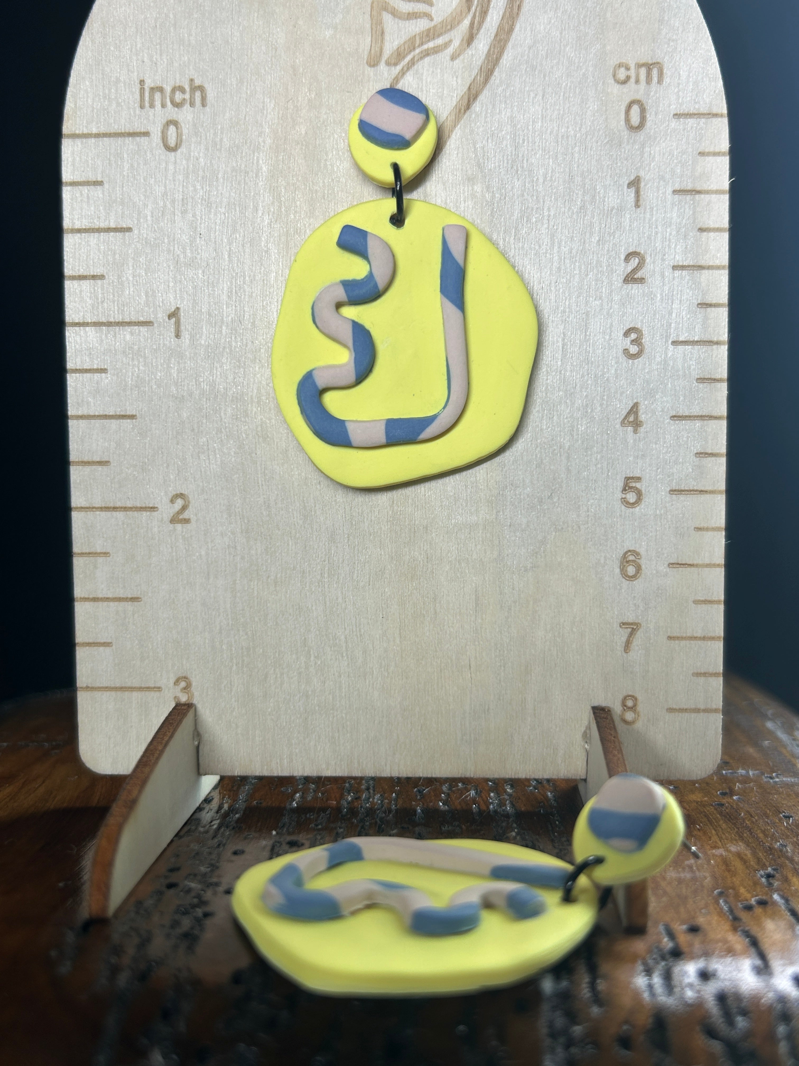 Rounded Yellow, blue and white earrings