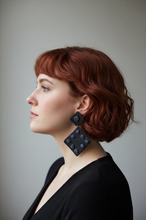 Black diamond dot earring on model